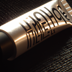 Suggested Image Prompt: Close-up of a tube of makeup primer with light reflecting off of it.