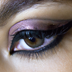 A close-up of an eye with a dramatic winged eyeliner look.