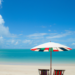 A beach chair with a beach umbrella and a clear beach sky.