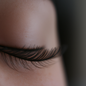 Close up of a pair of eyelashes with a dramatic curl.