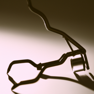 Close-up of an eyelash curler with a reflection of light on the metal.