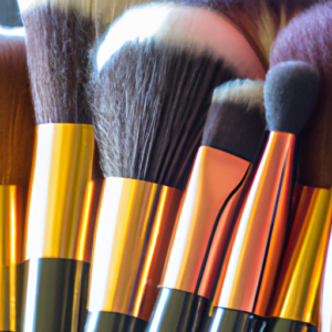 A close-up of a variety of makeup brushes arranged in a fan shape.