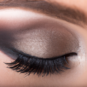 A close-up of a smoky eye makeup design in a neutral color palette.